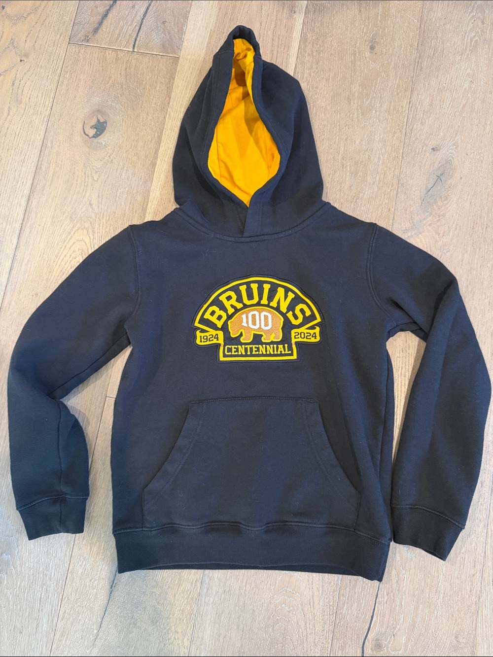 NHL Youth Black Hoodie with Yellow Bruins Centennial Patch size 10